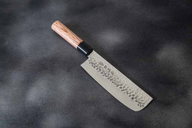 Man Sharpening A Japanese Nakiri Knife With Whetstone Sharpener Or  Grindstone On White Background Stock Photo - Download Image Now - iStock